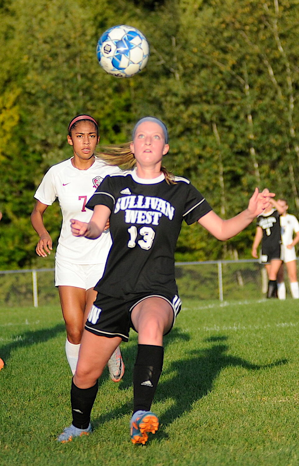 Heads-up soccer. Sullivan West’s Sophie Flynn gets her noggin in the game as O’Neill’s Jael-Marie Guy closes in on the action.